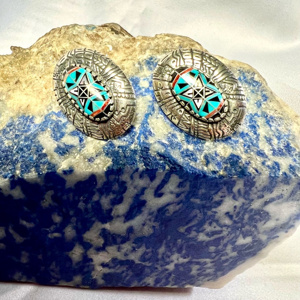 Roderick Tenorio Carolyn Pollack artists of Morning Star Relios earrings.